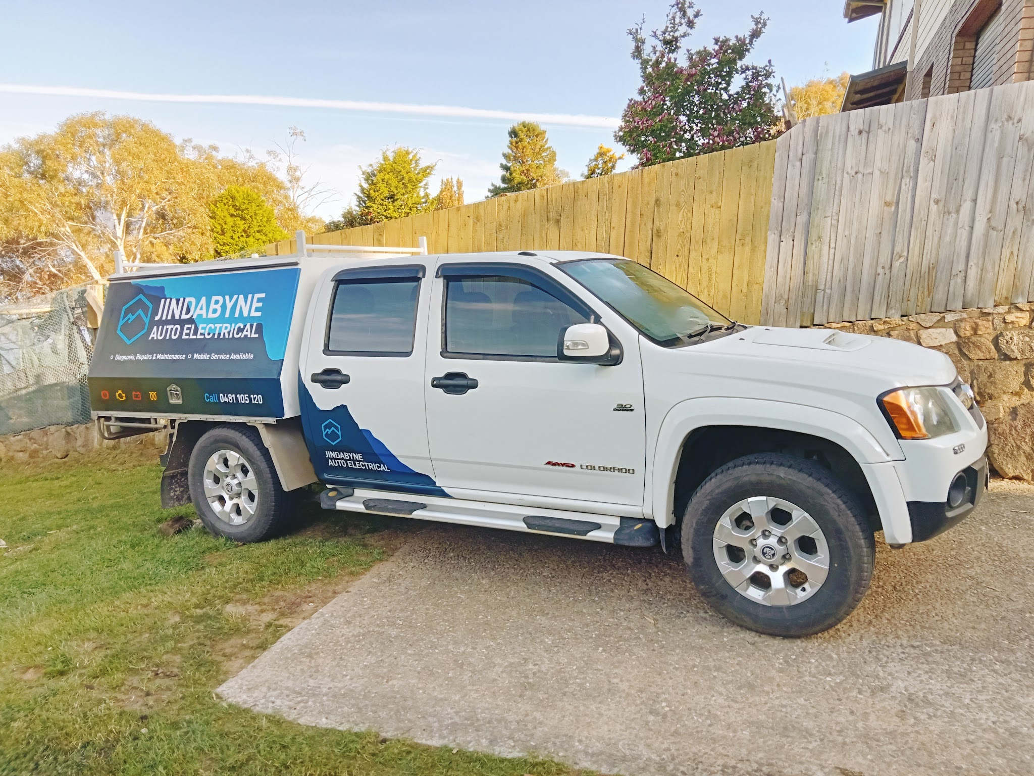 The signwritten Jindabyne Auto Electrical Holden Colorado work ute