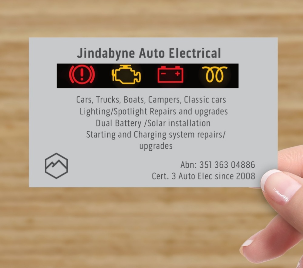 The front of the business card, listing the vehicles worked on and the Cert. 3 Auto Elec qualification